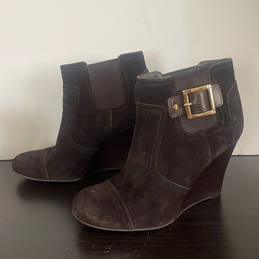 The heel is 3-7/8 Fits a size 8 to 8-1/2. Tory Burch Adrienne bootie. EUC .